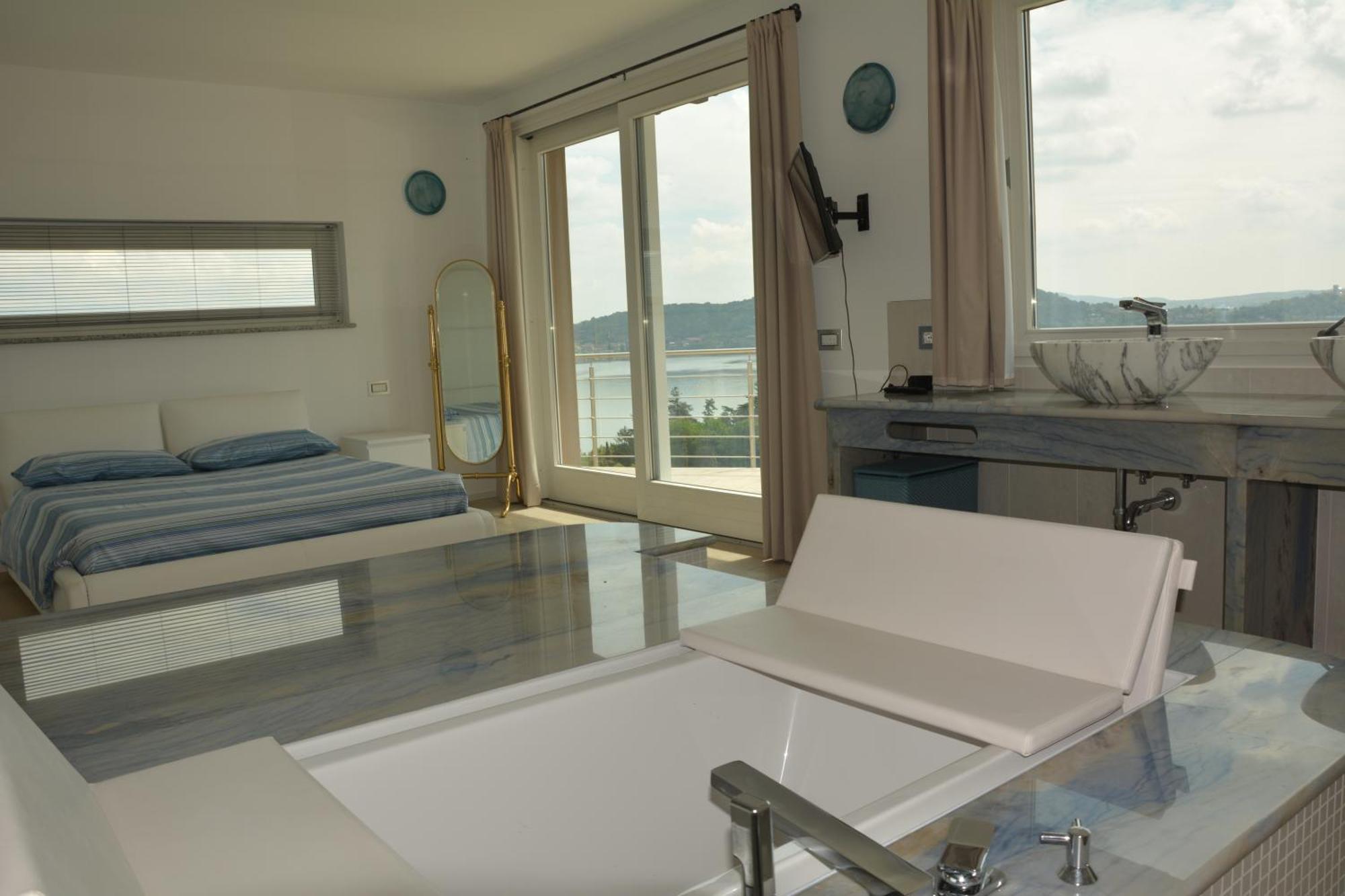 Il Girasole Apartment Meina Bilik gambar